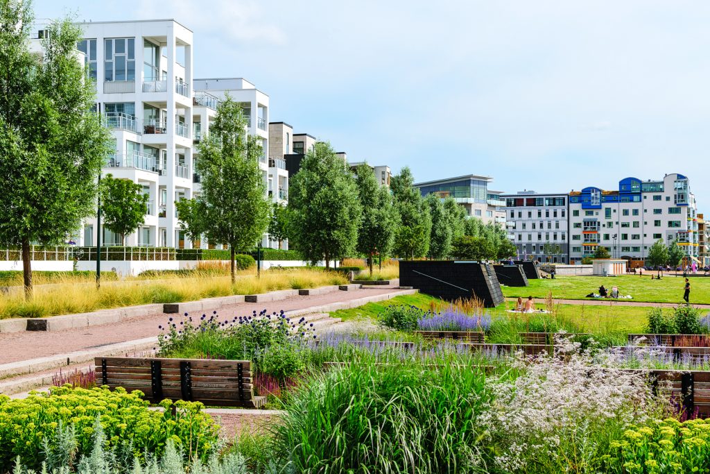 People resting in Vastra Hamnen district in Malmo. park